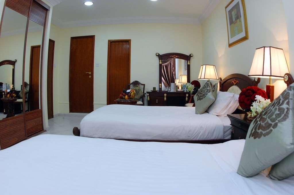 Al Muntazah Plaza Hotel Doha Oda fotoğraf